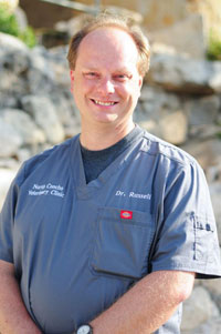 Dr. John E. Russell, D.V.M. - veterinarian